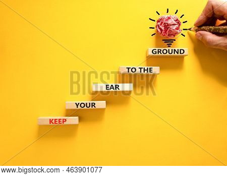 Keep Your Ear To The Ground Symbol. Concept Words Keep Your Ear On The Ground On Wooden Blocks. Busi