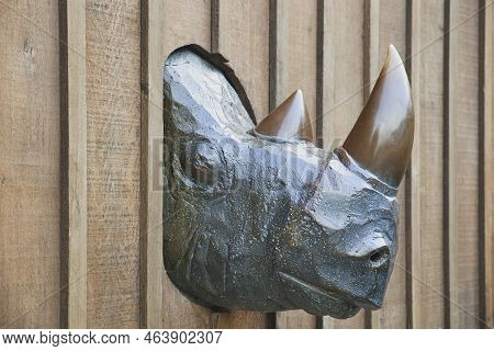 Aalborg, Denmark, July, 2022: Bronze Head Of A Rhinoceros In The Wall