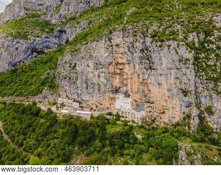 Monastery Of Ostrog, Serbian Orthodox Church Situated Against A Vertical Background, High Up In The 