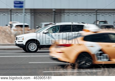 White Volvo Xc90 First Generation On The City Road. Fast Moving Car On Moscow Streets. Vehicle Drivi