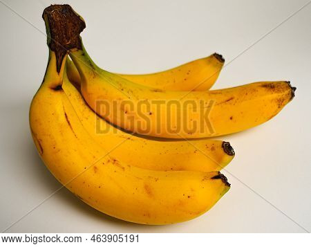 Yellow Ripe Tasty Bananas On A White Background, Isolated Bananas