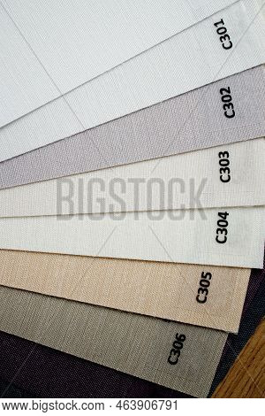 Samples Of Textured Fabrics Of Different Colors For The Manufacture Of Fabric Blinds For Sun Protect