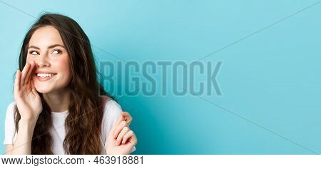 Cunning Silly Woman Spread Gossips, Talking Quiet, Telling Rumour, Smiling And Giggle At Right Side,