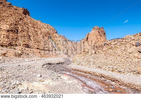 View At The Agoulzi Waterfall In Atlas Mountains Near Toumlilane Oasis In Morocco