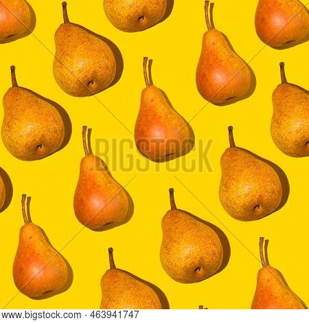 Colorful Pear Pattern. Orange Bera Pears On A Yellow Background. Ripe Juicy Fruits With Shadow Top V