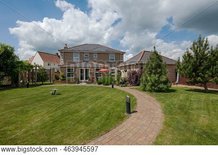 Stradishall, Suffolk, England - June 1 2017 Modern Detached Two Storey Brick House Within Landscaped