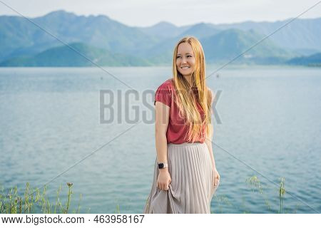 Woman Tourist On Background Of National Park Skadar Lake. Montenegro. Skadar Lake. Dawn. View From A