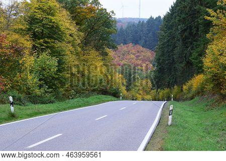 Country Falling In A Deep Valley With Autumn Fprest Around