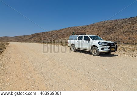 Hardap, Namibia - 29 September 2018: Typical 4x4 Rental Car In Namibia Equipped With Camping Gear An