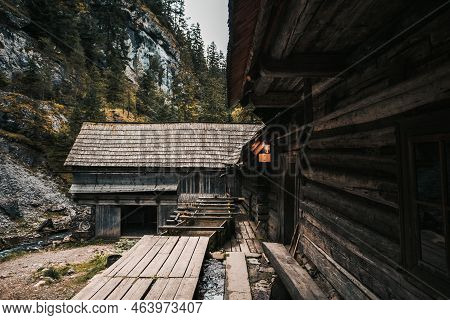 Beautiful Old Wooden Cabin Deep In The Forest - Mlyny Oblazy (slovakia). Old Wooden Mill With Rocks 