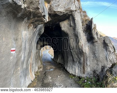 A Small Tunnel On The Footpath Above The Reservoir Lake Lago Di Lucendro Or In The Swiss Alpine Area