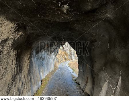 A Small Tunnel On The Footpath Above The Reservoir Lake Lago Di Lucendro Or In The Swiss Alpine Area