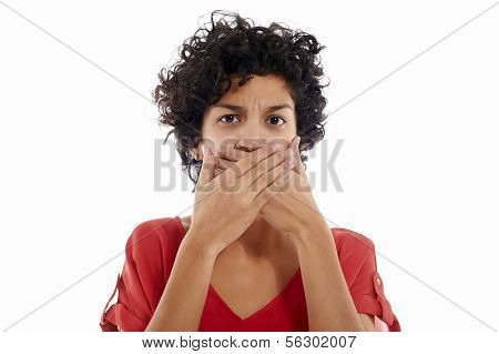 Sad Hispanic Woman With Hands On Mouth