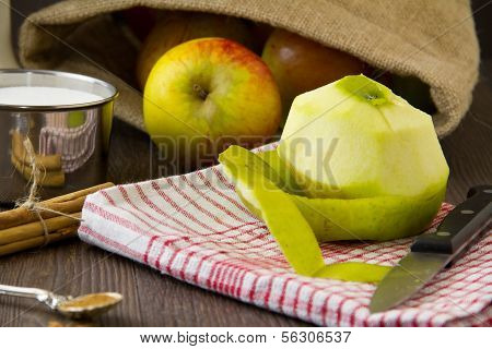 Peeled Apple With Ingredients For An Apple Pie