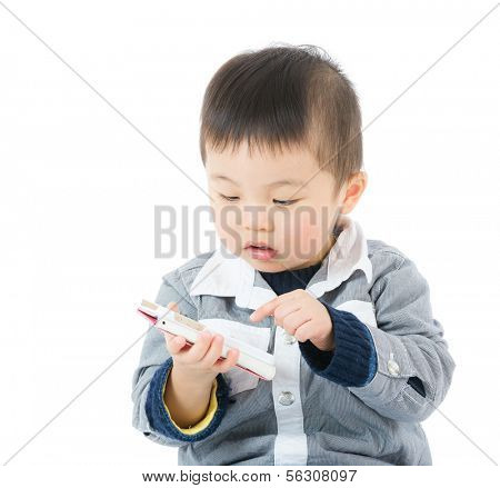 Young boy using mobile