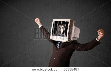 Business man with monitor screen on his head traped into a digital system concept