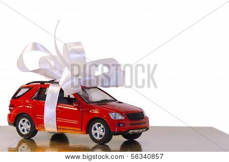 Red Car, Tied With White Ribbon