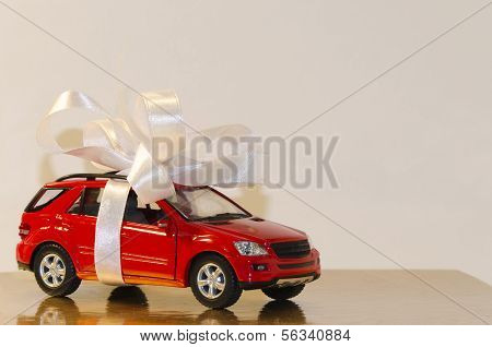 Red Car, Tied With White Ribbon