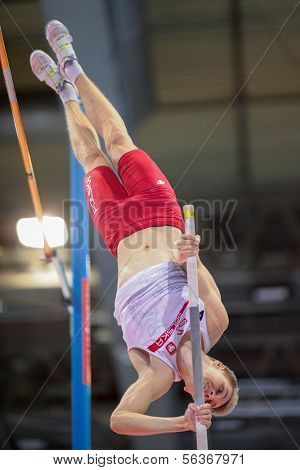 GOTHENBURG, SWEDEN - MARCH 2 Robert Sobera (POL) competes in the qualification of the men's pole vault event during the European Athletics Indoor Championship on March 2, 2013 in Gothenburg, Sweden.