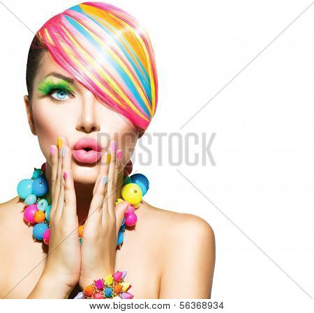 Beauty Woman Portrait with Colorful Makeup, Hair, Nail polish and Accessories. Colourful Studio Shot of Funny Model Girl. Vivid Colors. Manicure and Hairstyle. Rainbow Colors 