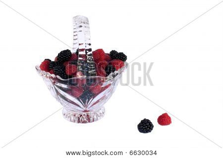 Glass Basket Full Of Raspberries And Blackberries