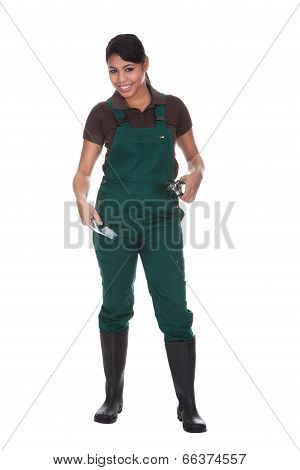 Young Female Gardner With Gardening Tools