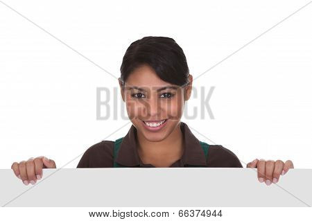 Young Female Gardner Holding Placard