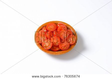 overhead view of bowl with halved cherry tomatoes
