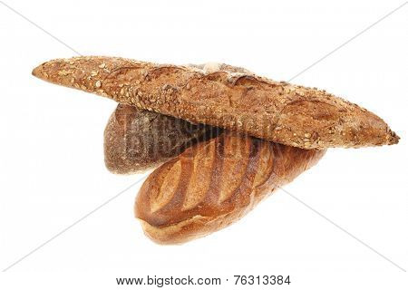 different rye and white flour bread loaf with french baguette isolated on white background