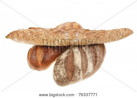 different rye and white flour bread loaf with french baguette isolated on white background