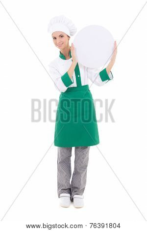 Young Chef Woman In Uniform Holding Big  Empty Plate With Copyspace Isolated On White