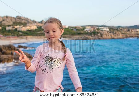 Adorable little girl have fun outdoors