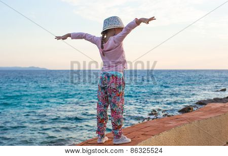 Adorable cute little girl have fun outdoor at italian vacation