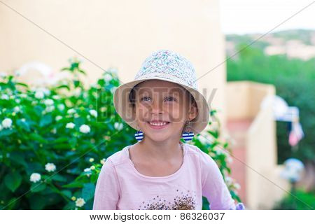 Adorable little girl have fun outdoors