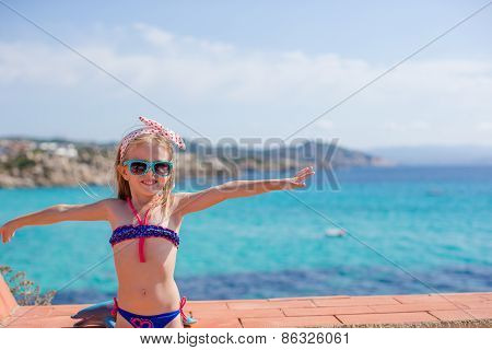 Adorable little girl have fun outdoors