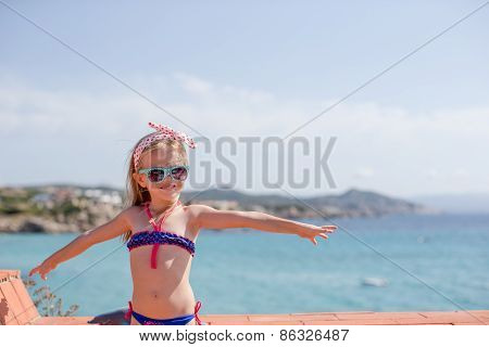 Adorable little girl have fun outdoors