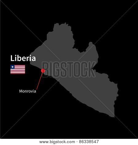 Detailed map of Liberia and capital city Monrovia with flag on black background