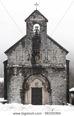 Ancient Church Stone Facade In Winter Time. Santiago. Roncesvalles. Spain