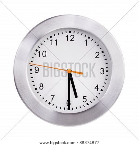 Office clock shows half past five