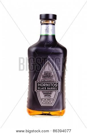 Hayward, CA - March 21, 2015: Bottle of Hornitos Black Barrel tequila anejo isolated on white - illustrative editorial