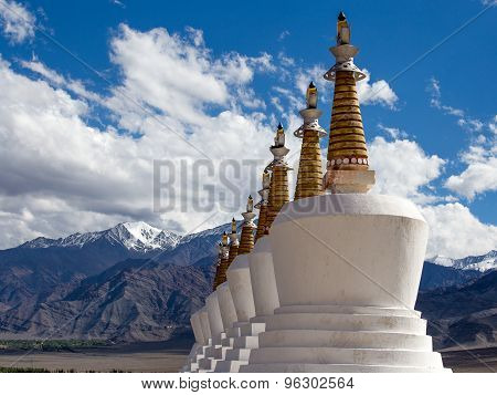 Buddhist Chortens (stupa) And Himalayas Mountains In The Background Near Shey Palace In Ladakh, Indi