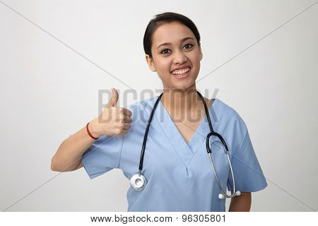 Young Indian medic showing thumbs up