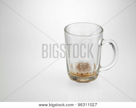 glass with little Tea with milk or Teh Tarik in Malaysia