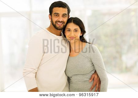 lovely indian couple portrait indoors