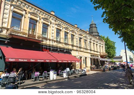 KAUNAS, LITHUANIA - JUNE, 01: People walk on a pedestrian street on June 01, 2015 in Kaunas, Lithuania.
