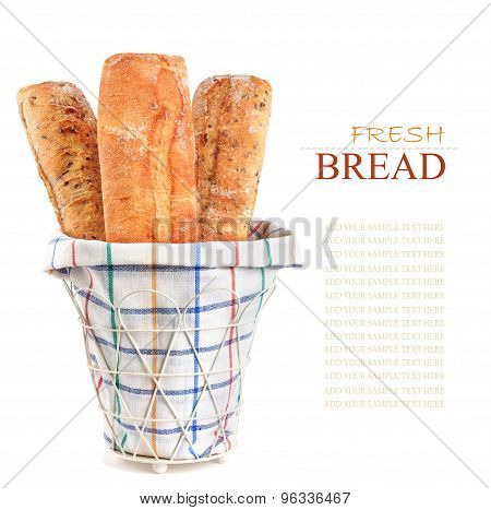 Three Fresh Loaf In Basket Isolated On Background