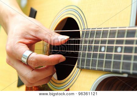 Finger picking the guitar