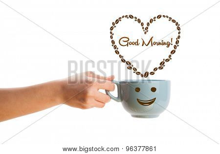 Coffee mug with coffee beans shaped heart with good morning sign, isolated on white