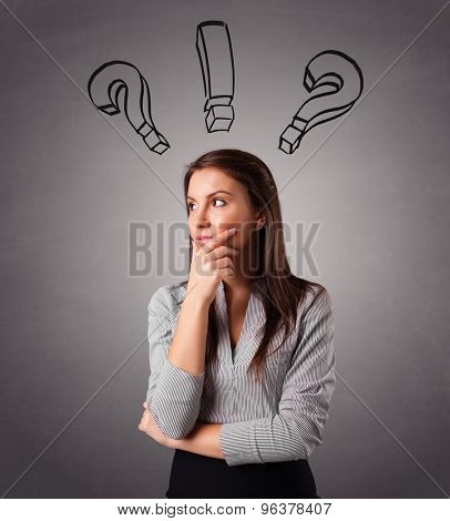 Beautiful young lady thinking with question marks overhead