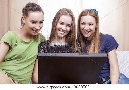 Modern Lifesrtyle Concept. Portrait Of Three Young Happy Laughing Caucasian Girlfriends With Persoma
